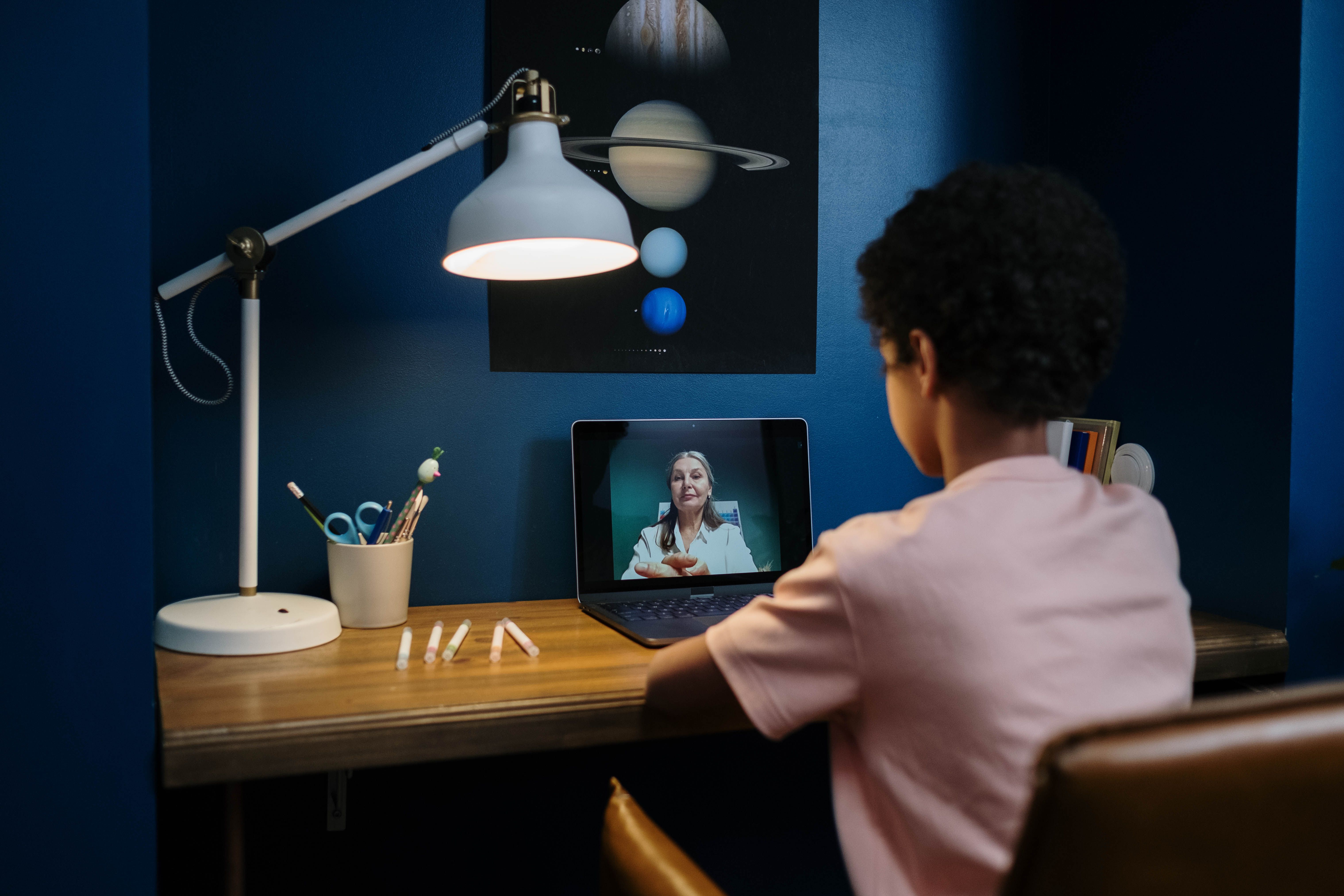 A Fasua student on a video call with their instructor